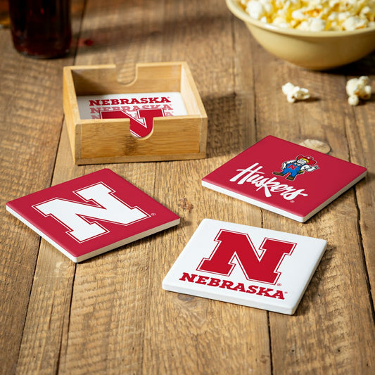 Team Sports America Trending - University of Nebraska Ceramic Coasters Set, 4pcs with Wood Caddy