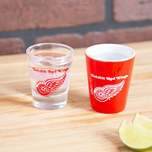 Team Sports America Recommended - Detroit Red Wings 4-Piece Ceramic and Glass 2oz. Shot Glass Set