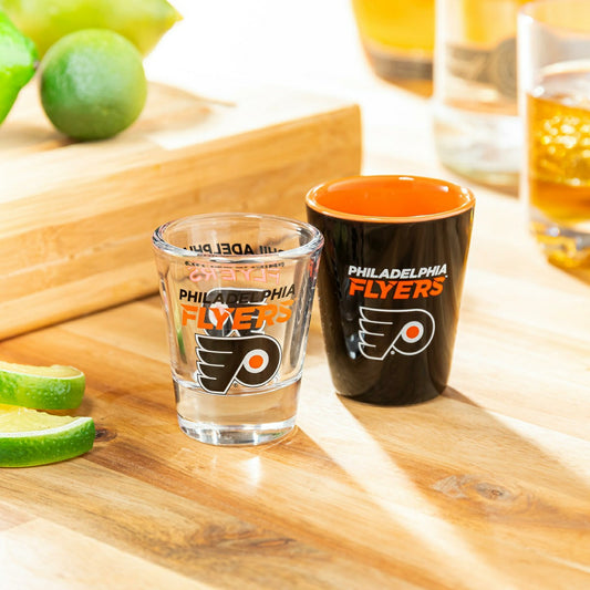 Team Sports America Trending - Philadelphia Flyers 4-Piece Ceramic and Glass 2oz. Shot Glass Set