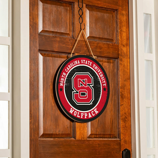 Team Sports America Signature - North Carolina State University Round Door Décor with Hanging Rope, 18
