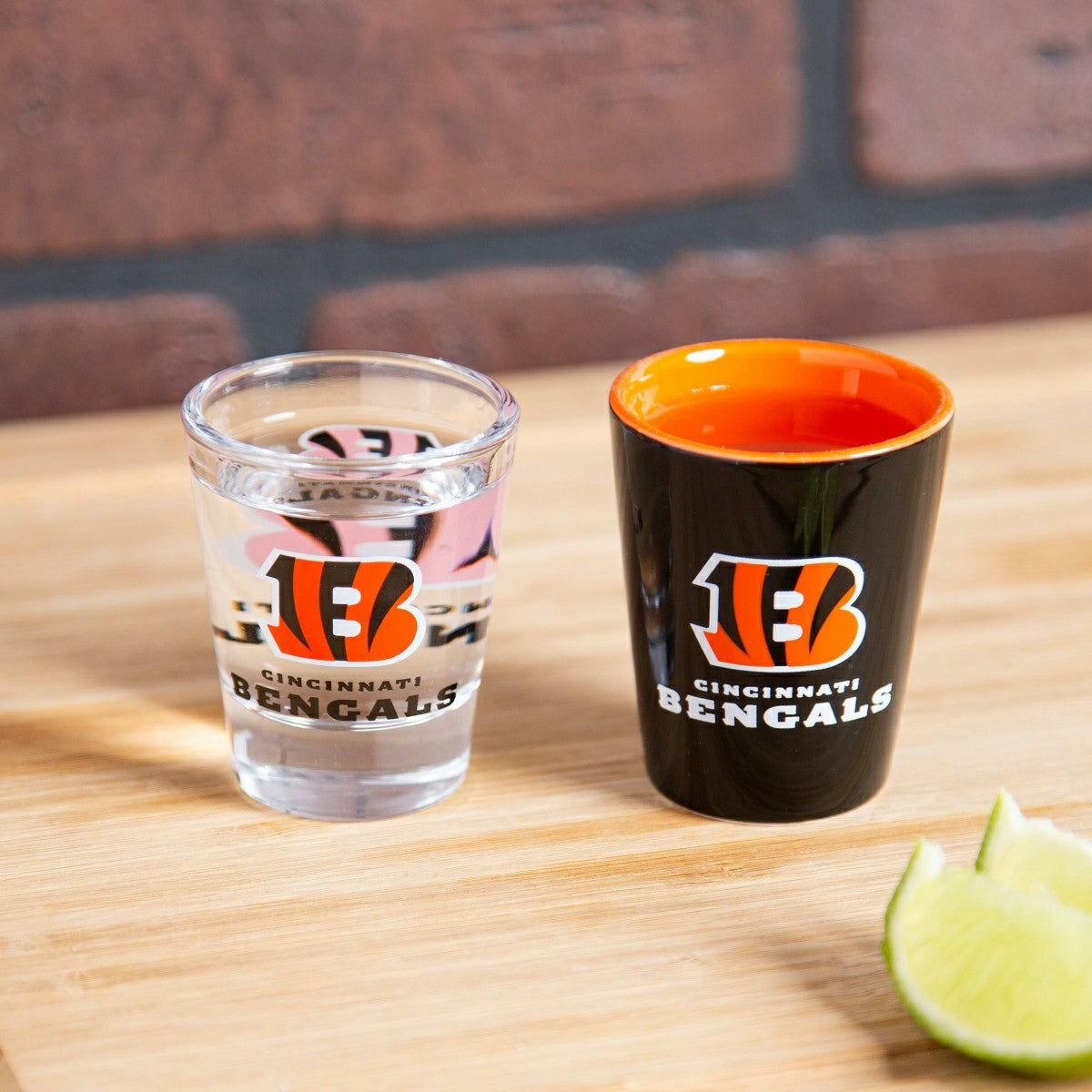 Team Sports America Trending - Cincinnati Bengals 4-Piece Ceramic and Glass 2oz. Shot Glass Set